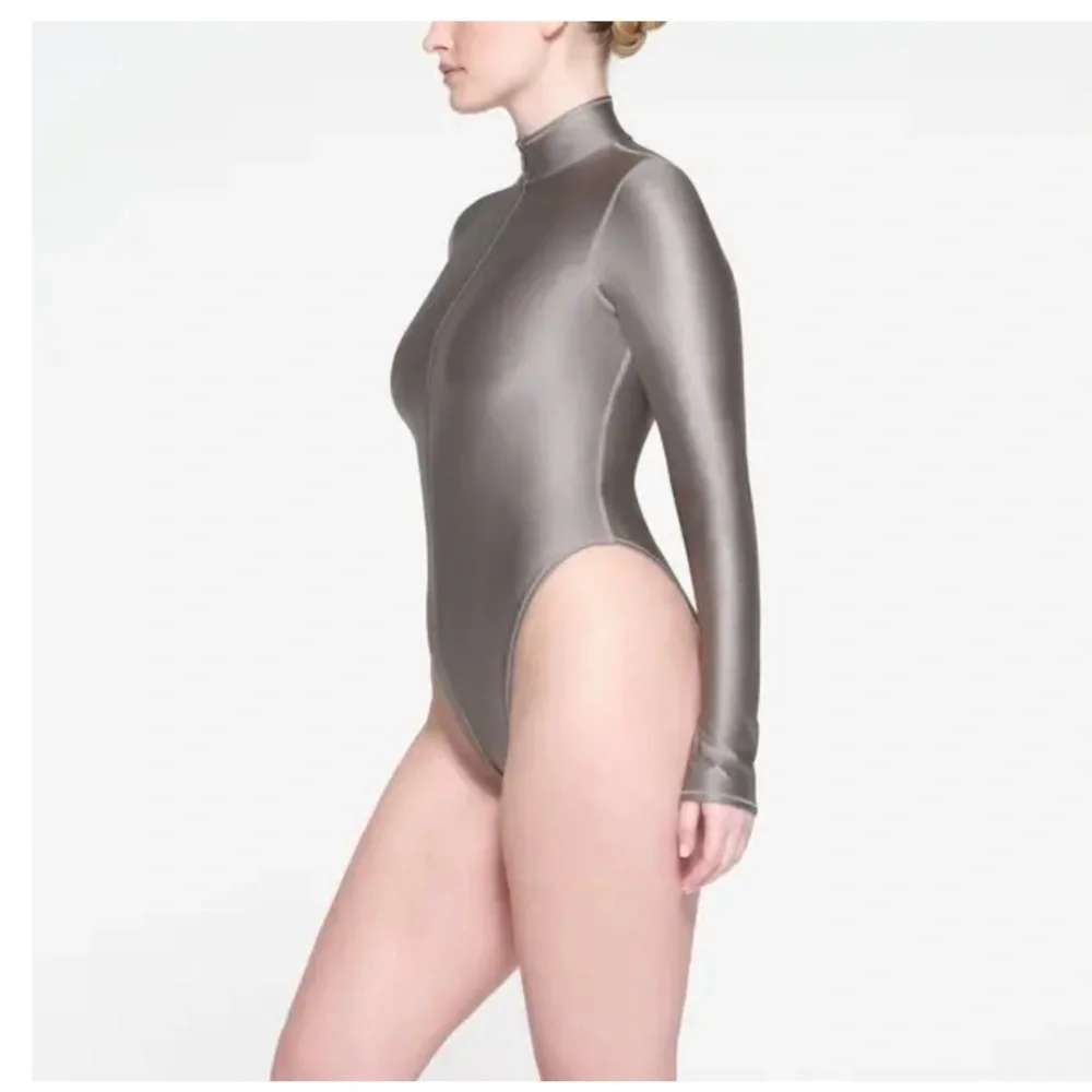 Skims shine swim zip front long sleeve one piece smoke medium nwt 🩶